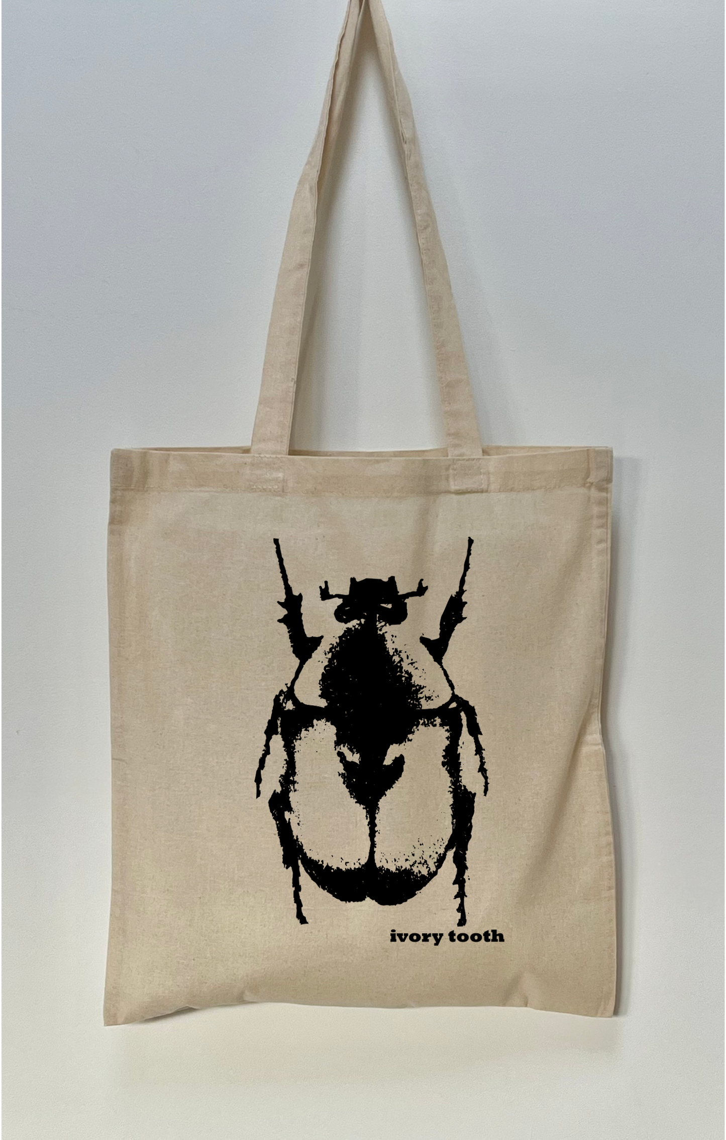 Ivory Tooth Beetle Tote Bag